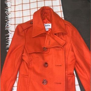 Orange knee length trench coat
